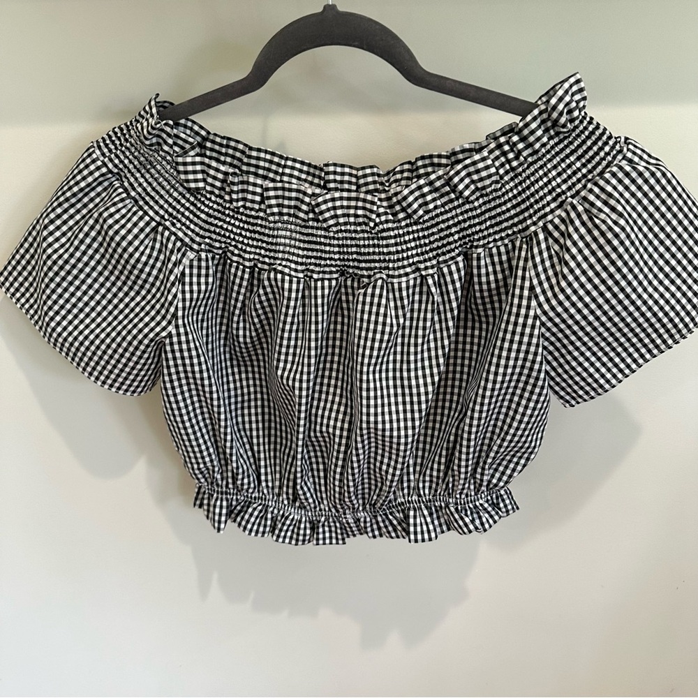 A boutique off shoulder gingham blouse